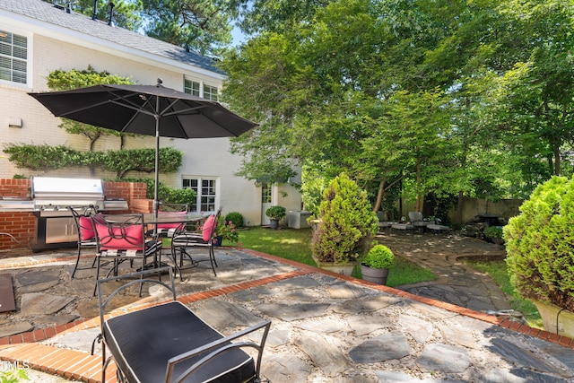 1610 Ridge Rd, Raleigh, NC 27607 - view of patio with a grill and outdoor dining area
