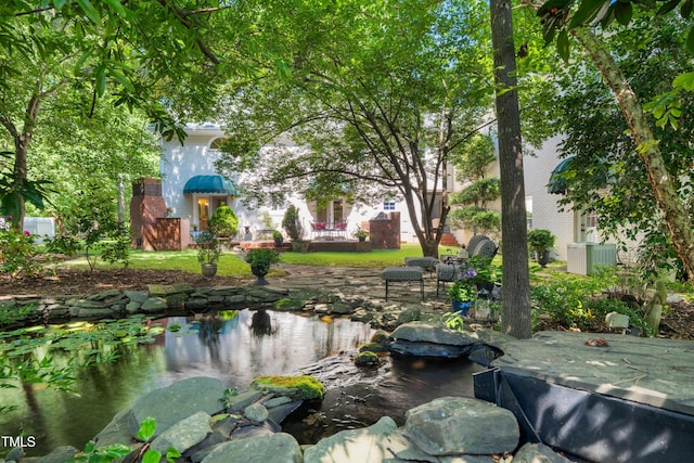 1610 Ridge Rd, Raleigh, NC 27607 - view of home's community with a garden pond