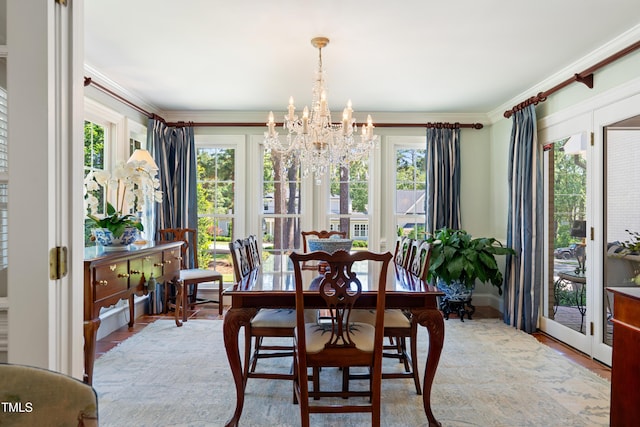 1610 Ridge Rd, Raleigh, NC 27607 - dining space with a chandelier and ornamental molding