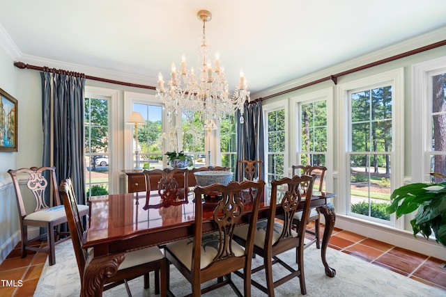 1610 Ridge Rd, Raleigh, NC 27607 - tiled dining room featuring a chandelier, plenty of natural light, and ornamental molding