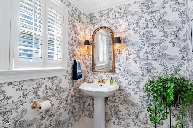 1610 Ridge Rd, Raleigh, NC 27607 - bathroom with plenty of natural light, wallpapered walls, crown molding, and tile patterned flooring