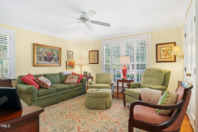 1610 Ridge Rd, Raleigh, NC 27607 - living area with crown molding, a ceiling fan, and wood finished floors