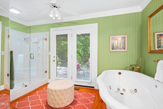 1610 Ridge Rd, Raleigh, NC 27607 - full bath with wood finished floors, crown molding, a tub with jets, a shower stall, and a ceiling fan