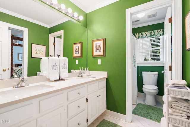 1610 Ridge Rd, Raleigh, NC 27607 - bathroom with double vanity, tile patterned flooring, and crown molding