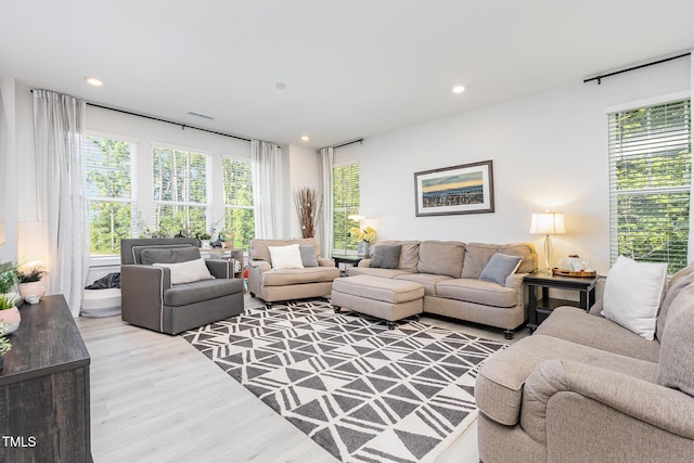 2866 Hunter Woods Dr, Apex, NC 27502 - living area featuring wood finished floors and recessed lighting