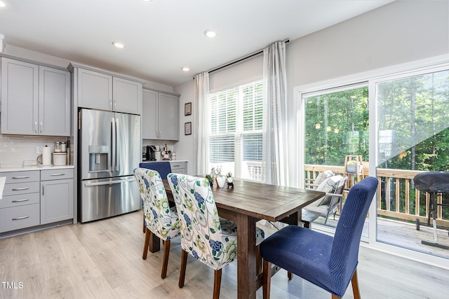 2866 Hunter Woods Dr, Apex, NC 27502 - dining room with light wood finished floors and recessed lighting