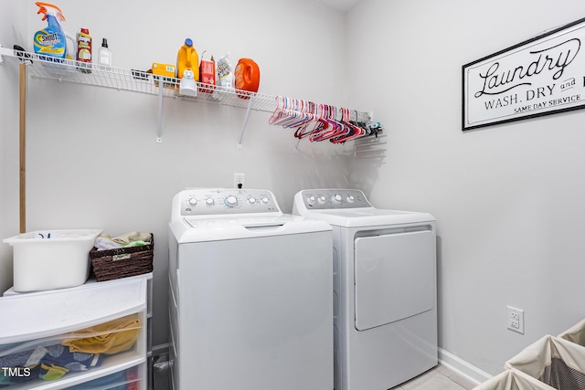 2866 Hunter Woods Dr, Apex, NC 27502 - laundry area featuring independent washer and dryer and tile patterned floors