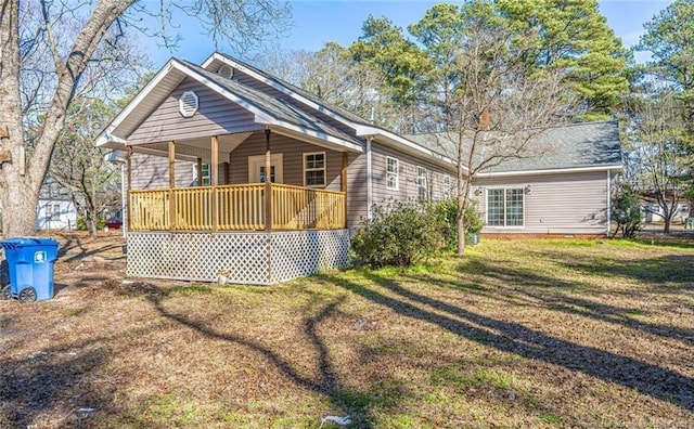 817 Aberdeen Rd, Laurinburg, NC 28352 - view of front of house with a front yard and covered porch