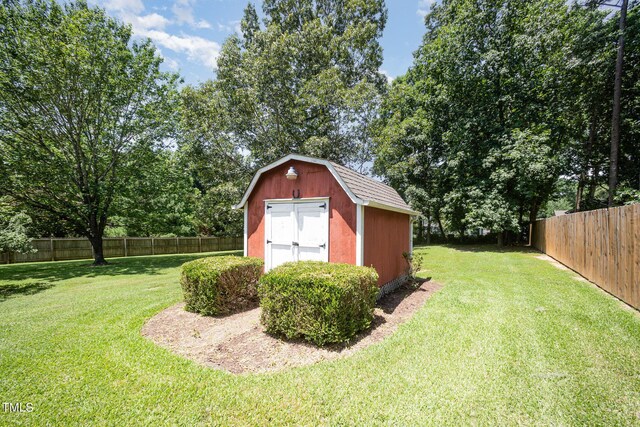 1822 Atterbury Ln, Durham, NC 27712 - view of shed with a fenced backyard