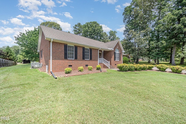1822 Atterbury Ln, Durham, NC 27712 - single story home featuring brick siding, crawl space, a front lawn, and a shingled roof