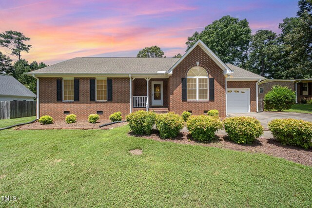 1822 Atterbury Ln, Durham, NC 27712 - ranch-style house featuring crawl space, a garage, driveway, brick siding, and roof with shingles