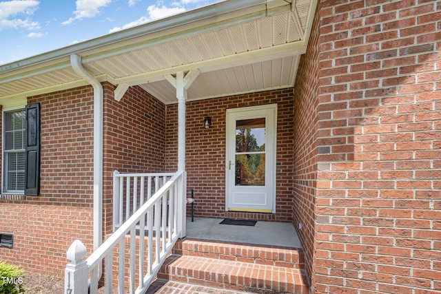 1822 Atterbury Ln, Durham, NC 27712 - view of exterior entry featuring brick siding