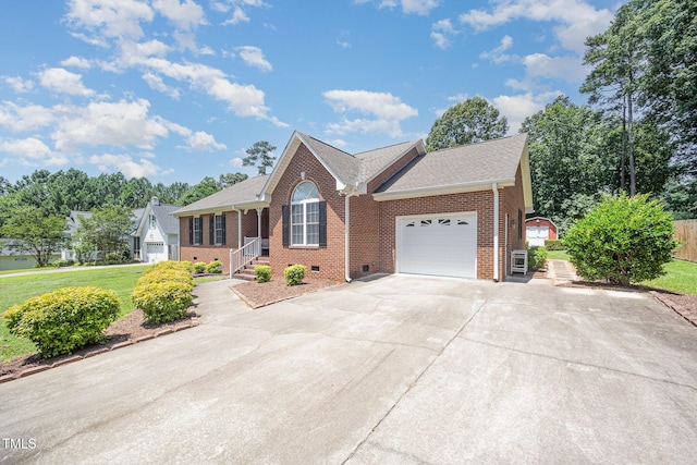 1822 Atterbury Ln, Durham, NC 27712 - single story home featuring an attached garage, brick siding, driveway, crawl space, and roof with shingles