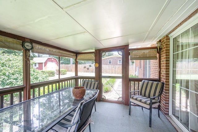1822 Atterbury Ln, Durham, NC 27712 - sunroom / solarium with outdoor dining space