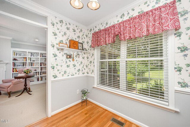 1822 Atterbury Ln, Durham, NC 27712 - interior space featuring wallpapered walls, wood finished floors, ornamental molding, and wainscoting
