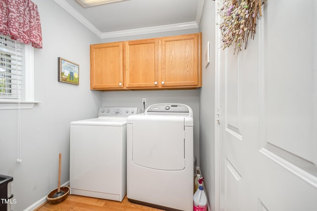 1822 Atterbury Ln, Durham, NC 27712 - washroom with cabinet space, independent washer and dryer, ornamental molding, and light wood-style flooring