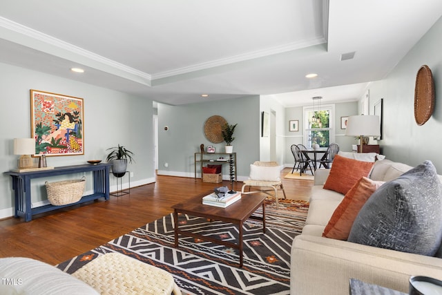 2804 Barmettler St, Raleigh, NC 27607 - living area featuring crown molding, wood finished floors, recessed lighting, and a tray ceiling