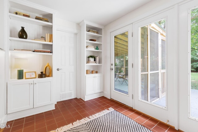 2804 Barmettler St, Raleigh, NC 27607 - doorway to outside with dark tile patterned floors