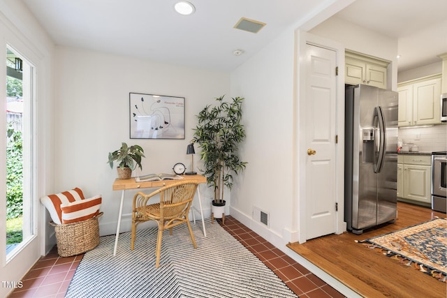 2804 Barmettler St, Raleigh, NC 27607 - office space featuring healthy amount of natural light, dark tile patterned floors, and recessed lighting