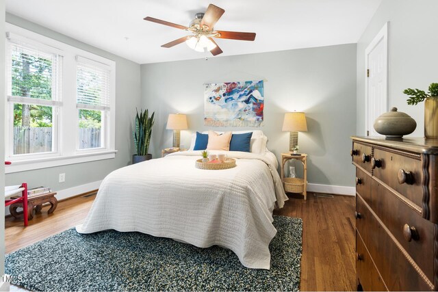 2804 Barmettler St, Raleigh, NC 27607 - bedroom featuring wood finished floors and a ceiling fan