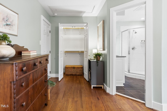 2804 Barmettler St, Raleigh, NC 27607 - corridor with wood finished floors and attic access