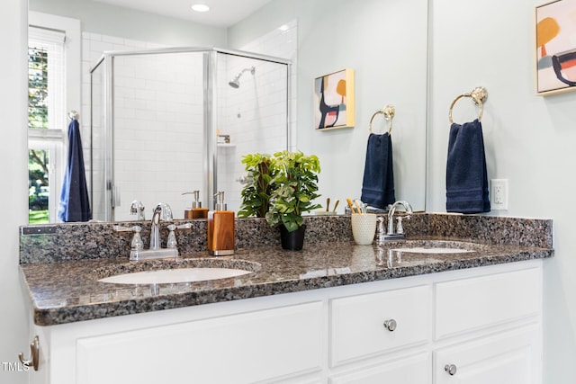2804 Barmettler St, Raleigh, NC 27607 - full bath featuring double vanity, a stall shower, and recessed lighting