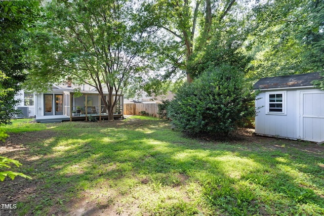 2804 Barmettler St, Raleigh, NC 27607 - view of yard featuring a storage unit and a deck
