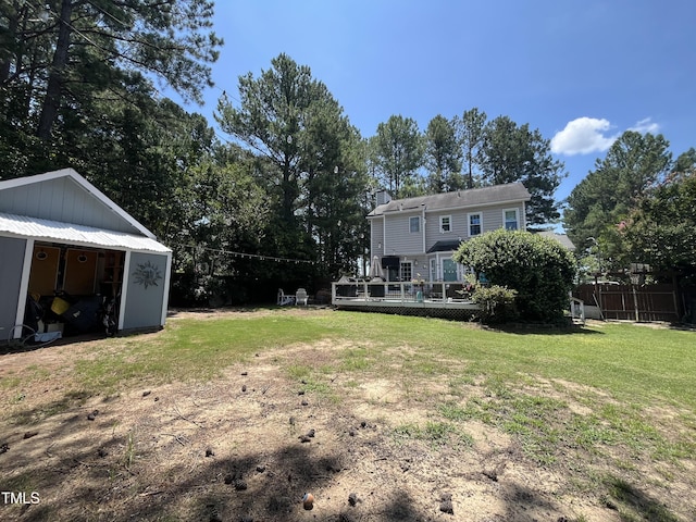 4117 Mangrove Dr, Raleigh, NC 27616 - view of yard with a wooden deck and a storage shed