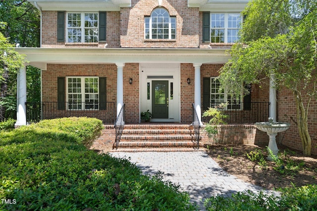 5106 Stockton Way, Durham, NC 27707 - property entrance with covered porch and brick siding