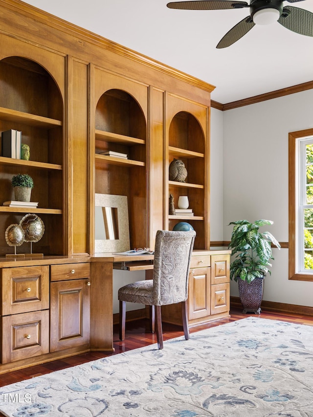 5106 Stockton Way, Durham, NC 27707 - office area with ornamental molding, a ceiling fan, wood finished floors, and built in shelves