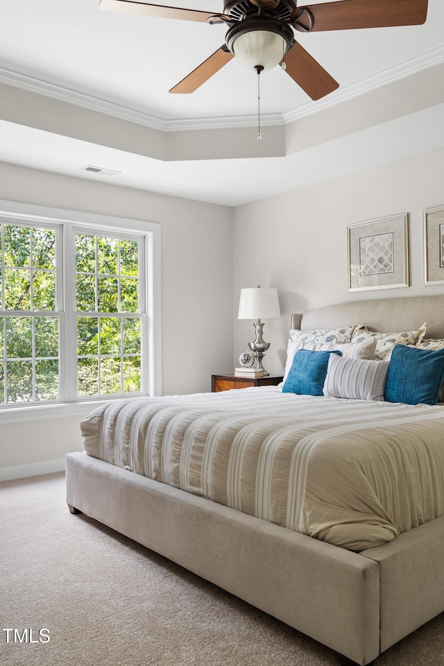 5106 Stockton Way, Durham, NC 27707 - carpeted bedroom featuring ornamental molding and a ceiling fan