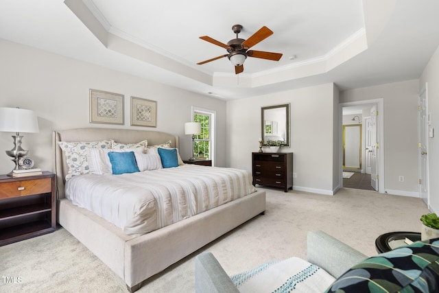 5106 Stockton Way, Durham, NC 27707 - carpeted bedroom with a tray ceiling, crown molding, and a ceiling fan