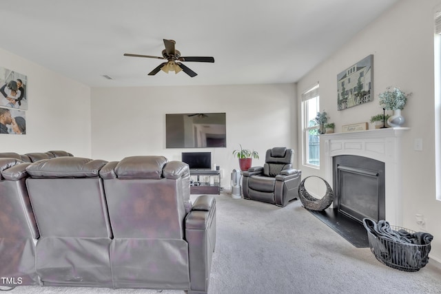 2123 Scarlet Sage Dr, Durham, NC 27704 - carpeted living area featuring ceiling fan and a glass covered fireplace