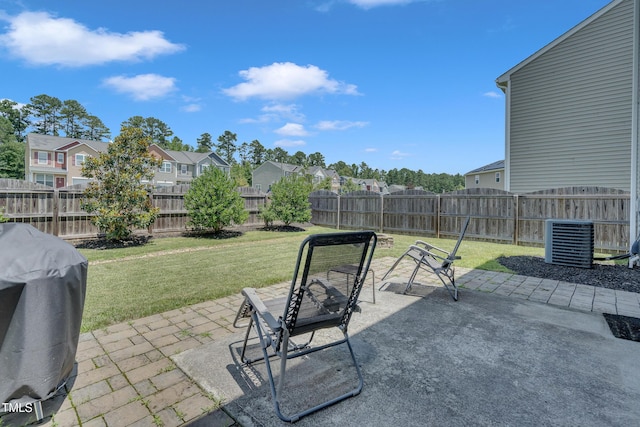 2123 Scarlet Sage Dr, Durham, NC 27704 - fenced backyard featuring a residential view, a patio area, and grilling area
