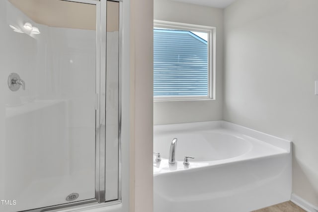 2123 Scarlet Sage Dr, Durham, NC 27704 - bathroom featuring a stall shower and a bath