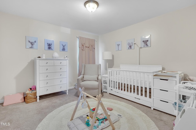 2123 Scarlet Sage Dr, Durham, NC 27704 - carpeted bedroom featuring a nursery area