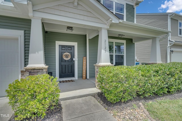 2123 Scarlet Sage Dr, Durham, NC 27704 - view of exterior entry featuring covered porch and stone siding