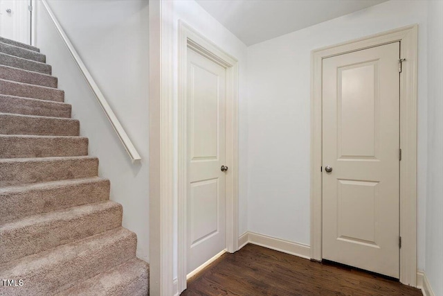 1309 Hill St, Durham, NC 27707 - stairs featuring wood finished floors and baseboards