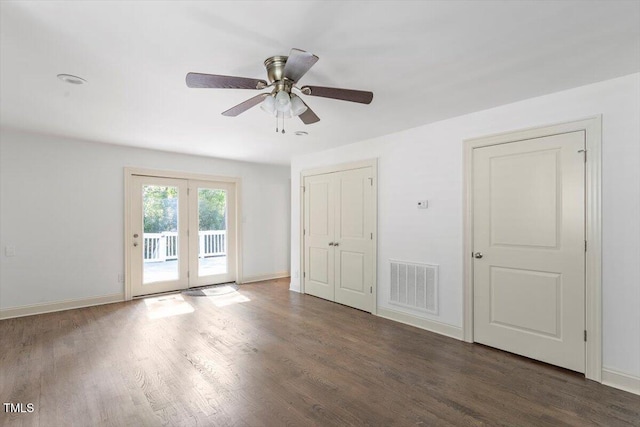 1309 Hill St, Durham, NC 27707 - spare room with wood finished floors and a ceiling fan