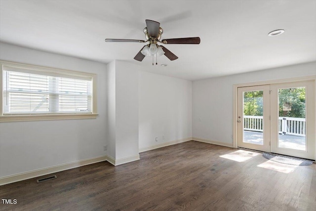 1309 Hill St, Durham, NC 27707 - empty room with wood finished floors and a ceiling fan