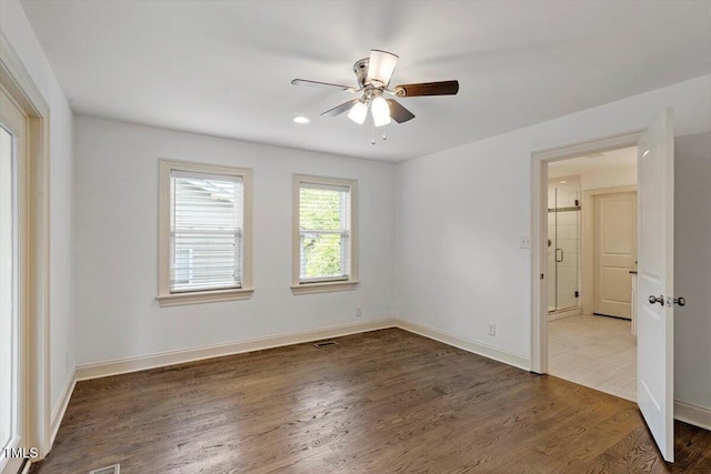 1309 Hill St, Durham, NC 27707 - spare room with a ceiling fan, wood finished floors, and recessed lighting