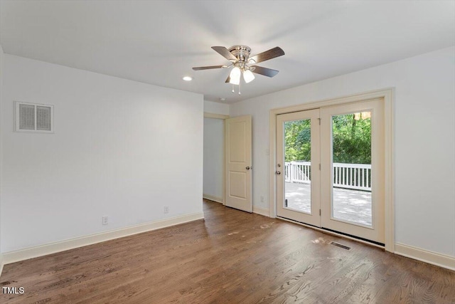 1309 Hill St, Durham, NC 27707 - empty room featuring wood finished floors, a ceiling fan, and recessed lighting