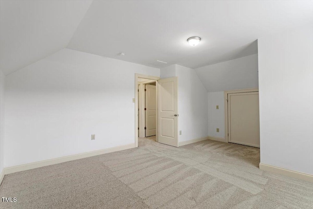 1309 Hill St, Durham, NC 27707 - additional living space with lofted ceiling and carpet