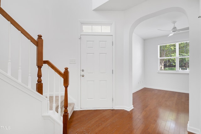238 Royal Tower Way, Cary, NC 27513 - entryway with wood finished floors, stairs, arched walkways, and a ceiling fan