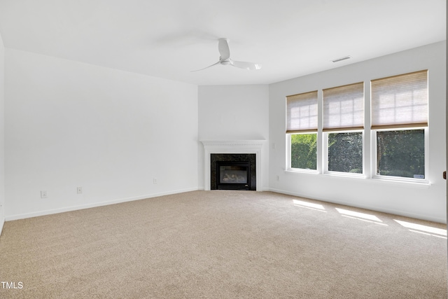 238 Royal Tower Way, Cary, NC 27513 - unfurnished living room featuring carpet, a ceiling fan, and a fireplace