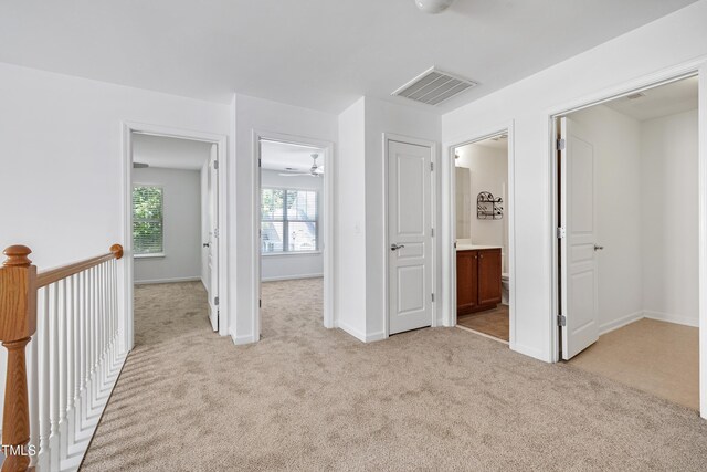 238 Royal Tower Way, Cary, NC 27513 - corridor featuring light carpet and baseboards