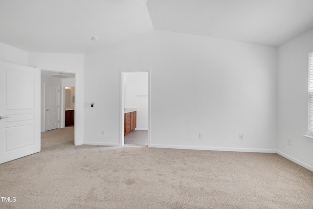 238 Royal Tower Way, Cary, NC 27513 - unfurnished bedroom with light colored carpet, vaulted ceiling, and ensuite bathroom