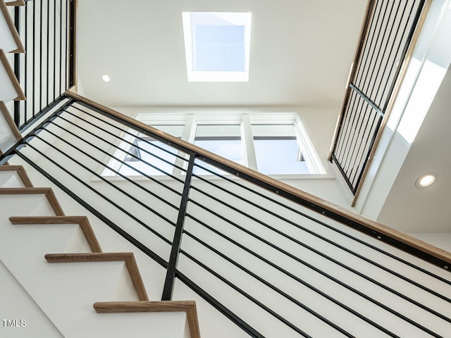 1009 Parker St, Raleigh, NC 27607 - stairway featuring a skylight and healthy amount of natural light