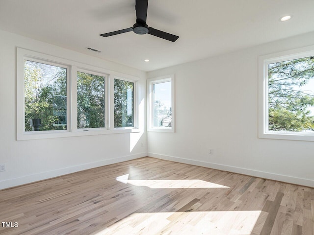 1009 Parker St, Raleigh, NC 27607 - spare room featuring ceiling fan, wood finished floors, and recessed lighting