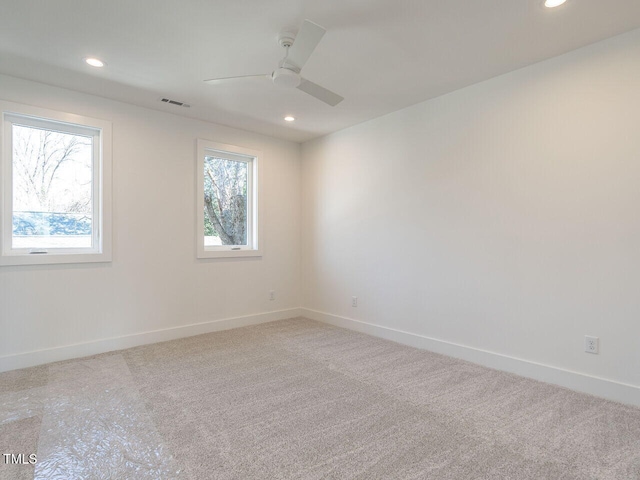 1009 Parker St, Raleigh, NC 27607 - unfurnished room featuring carpet, recessed lighting, and a ceiling fan